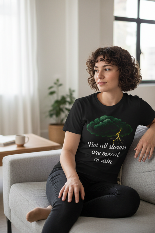 model wearing a Unisex t-shirt from the Storm Cloud Collection, featuring a Storm Mosquitos design that symbolizes mental health awareness and resilience. Character: Hope - Black front