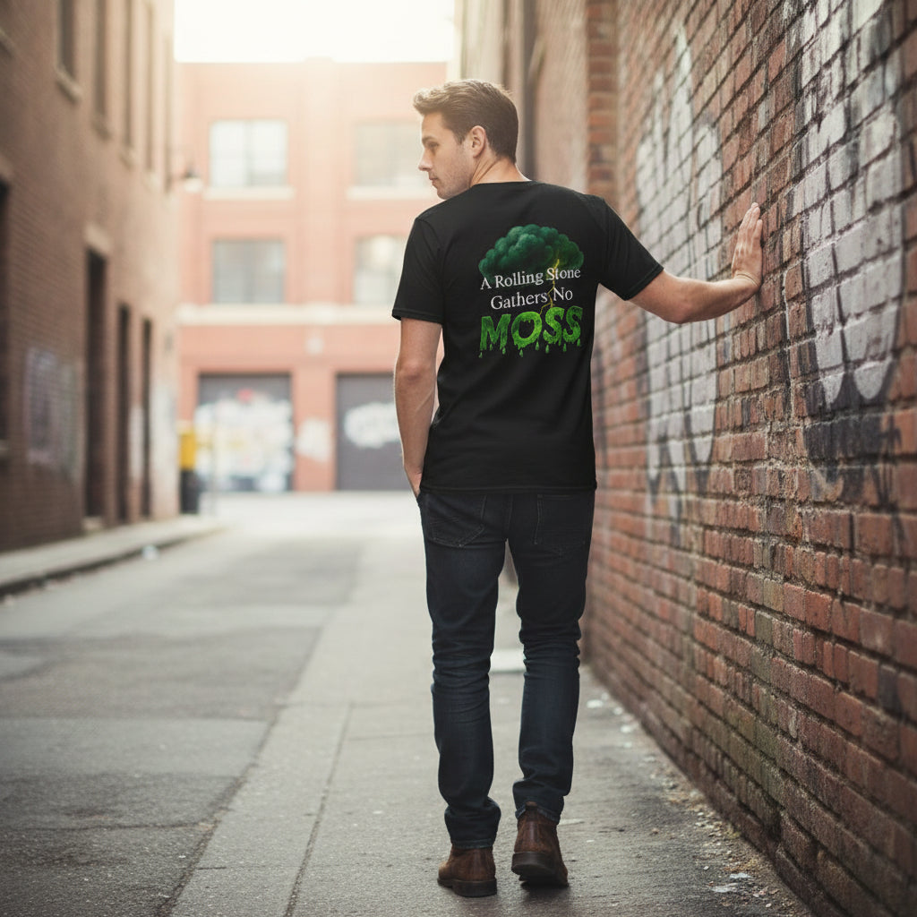 Person wearing a black t-shirt with a graphic and text on the back by Storm mosquitos apparel, standing against a wall