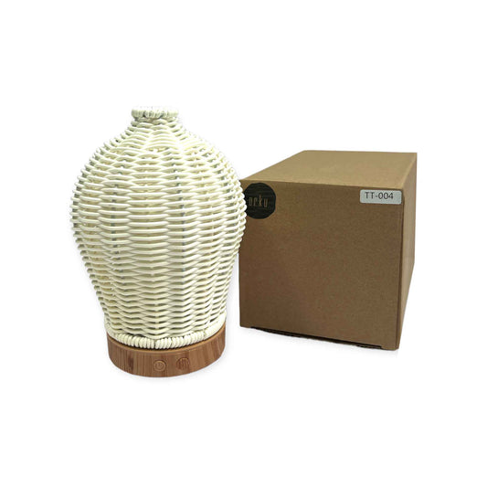 White rattan ultrasonic aroma diffuser with remote control and soft LED mist light shown with box